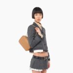LOGO EMBOSSED LEATHER TOP HANDLE BAG