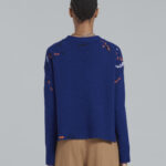 BLUE WOOL CARDIGAN WITH CONTRASTING MENDING