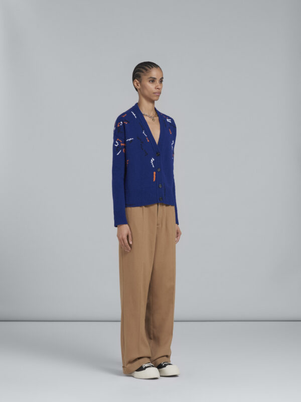 BLUE WOOL CARDIGAN WITH CONTRASTING MENDING