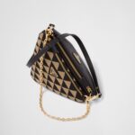 SYMBOLE LEATHER AND FABRIC MINI BAG