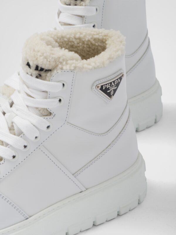 LEATHER AND SHEARLING HIGH TOP SNEAKERS
