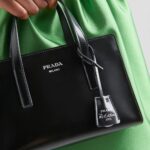 RE-EDITION 1995 BRUSHED LEATHER BAG