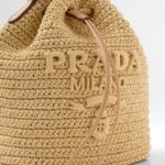 RAFFIA AND LEATHER BUCKET BAG
