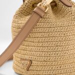 RAFFIA AND LEATHER BUCKET BAG
