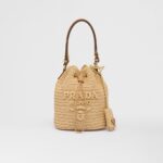 RAFFIA AND LEATHER BUCKET BAG