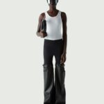 HYBRID FLARED FAUX LEATHER TROUSERS
