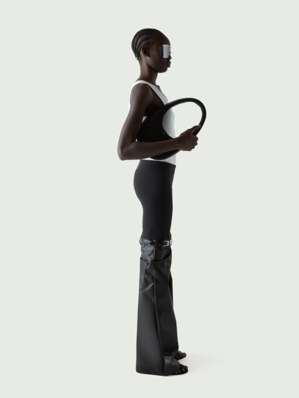 HYBRID FLARED FAUX LEATHER TROUSERS