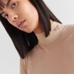 SHEER JERSEY BODYSUIT