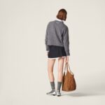 PLEATED PINSTRIPE MINI SKIRT