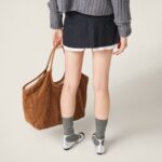 PLEATED PINSTRIPE MINI SKIRT