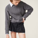 PLEATED PINSTRIPE MINI SKIRT