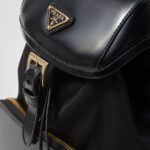RE-NYLON AND BRUSHED LEATHER BACKPACK