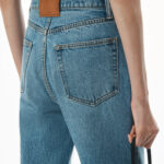 ez mid rise jean with embossed logo