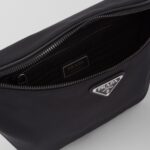RE NYLON AND SAFFIANO BELT BAG