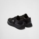 LEATHER AND RE-NYLON HIGH TOP SNEAKERS
