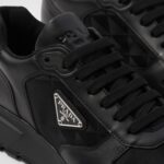 LEATHER AND RE-NYLON HIGH TOP SNEAKERS