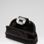 CAMELIA CLUTCH IN SATIN
