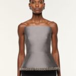 TAFFETA PEPLUM TOP WITH CRYSTAL TRIMMING