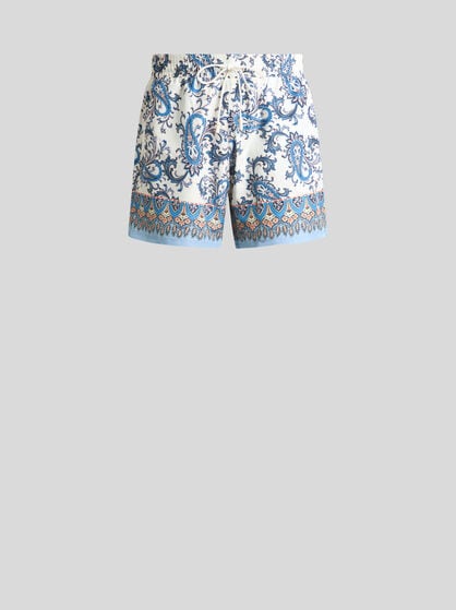 SWIM SHORTS WITH PLACED LEAFY PAISLEY PRINT