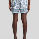 SWIM SHORTS WITH PLACED LEAFY PAISLEY PRINT