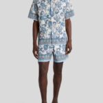 SWIM SHORTS WITH PLACED LEAFY PAISLEY PRINT